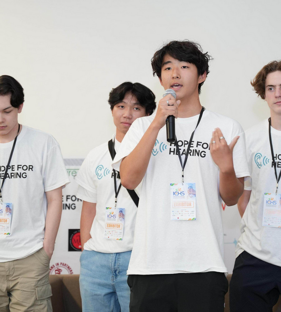 Hope For Hearing team presenting at a conference